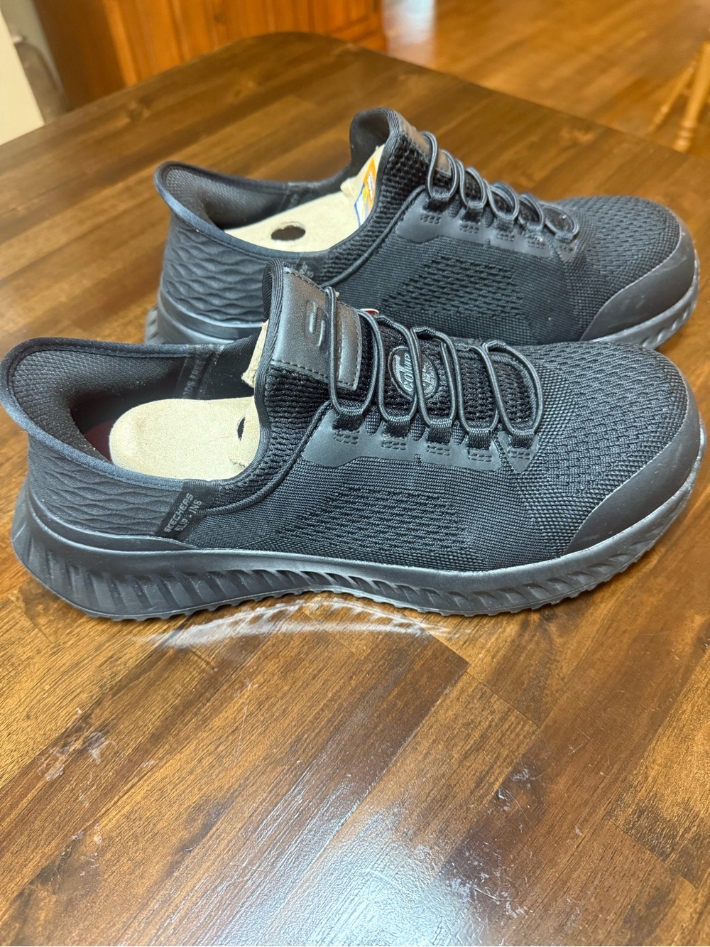 Skechers Men's Black Slip-On Work Shoes with composite toe size 10 wide